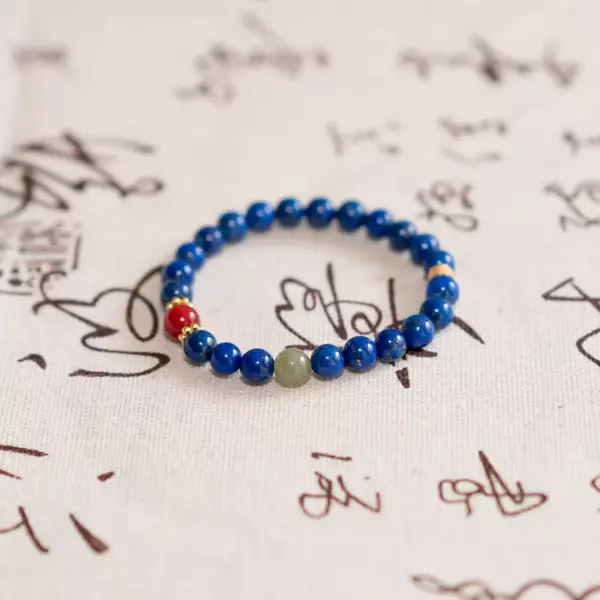 Wisdom Flame Bracelet — lapis lazuli & red agate bracelet