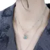 Forest Spirit Necklace — green fluorite bird pendant