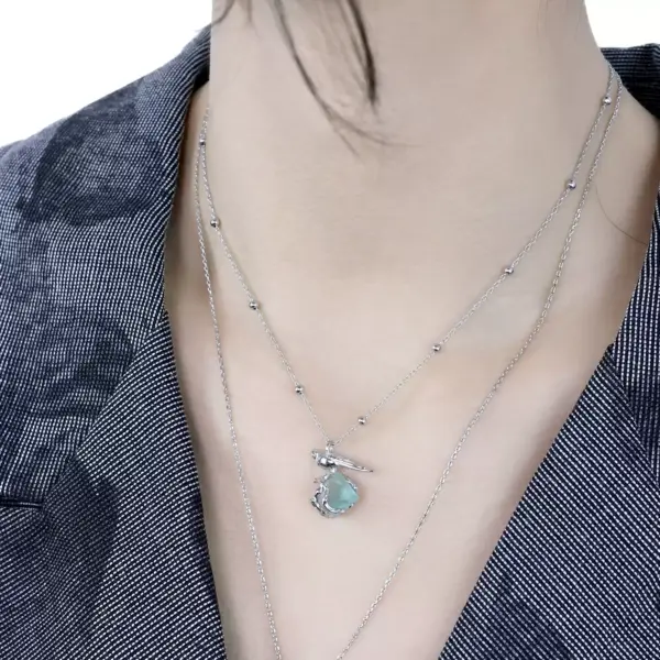Forest Spirit Necklace — green fluorite bird pendant